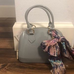 Brand new purple Betsey Johnson bag